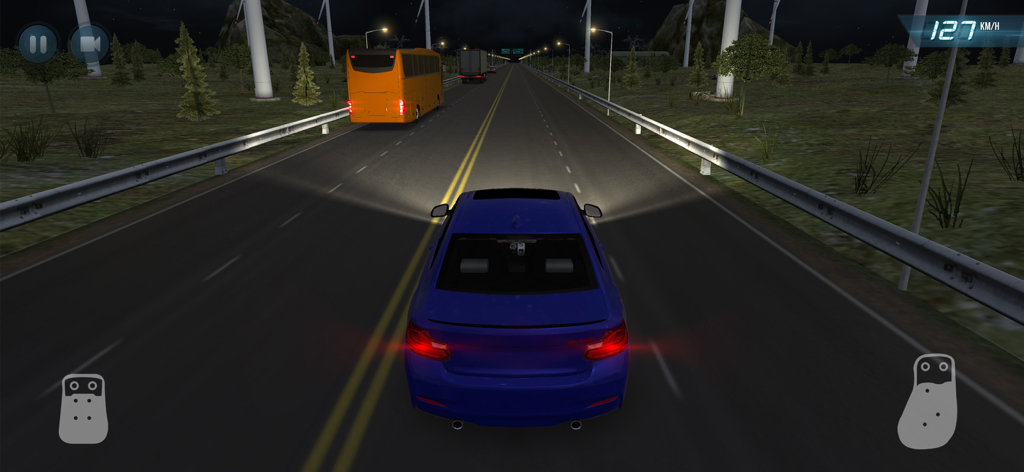 Traffic Driver 2 - A blue sports car driving on a dark highway at night in the Traffic Driver 2 mobile game