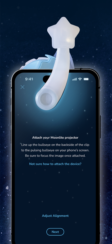Moonlite - Storytime Projector - A smartphone screen showing instructions for attaching and aligning the Moonlite star shaped physical projector over the phone lens