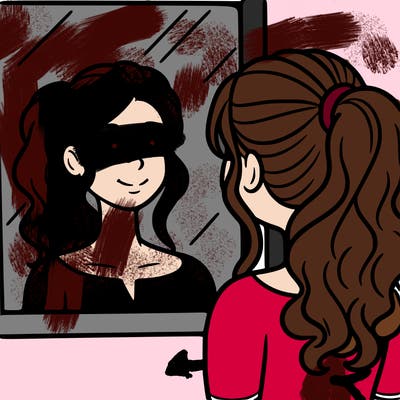 a woman looks at her reflection in the mirror