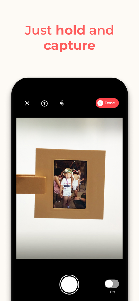 SlideScan - Slide Scanner App - Smartphone screen showing the SlideScan app capturing a physical photo slide for digitization