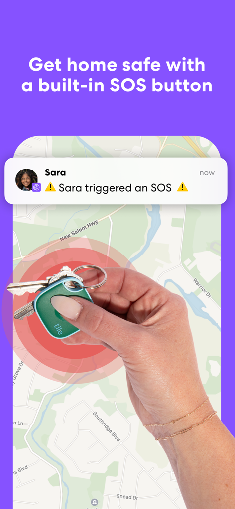 A hand holding keys with a green Tile tracker over a map showing an SOS notification alert.