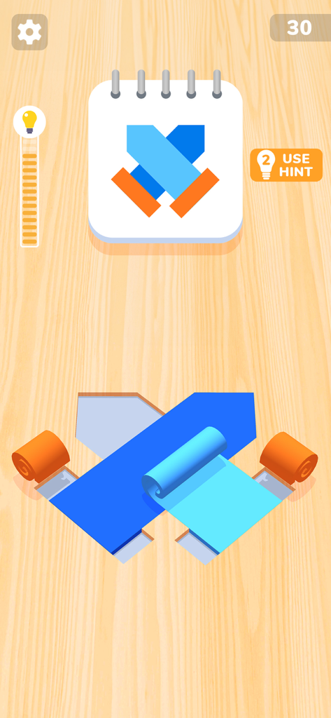 Color Roll 3D: Puzzle Art Game - Color Roll 3Dパズルゲームプレイ、木製の背景にターゲット画像を一致させるために青とオレンジのロールを巻き戻している様子