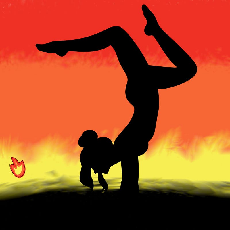 a woman doing a handstand