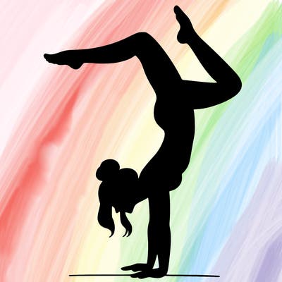 a woman doing a handstand