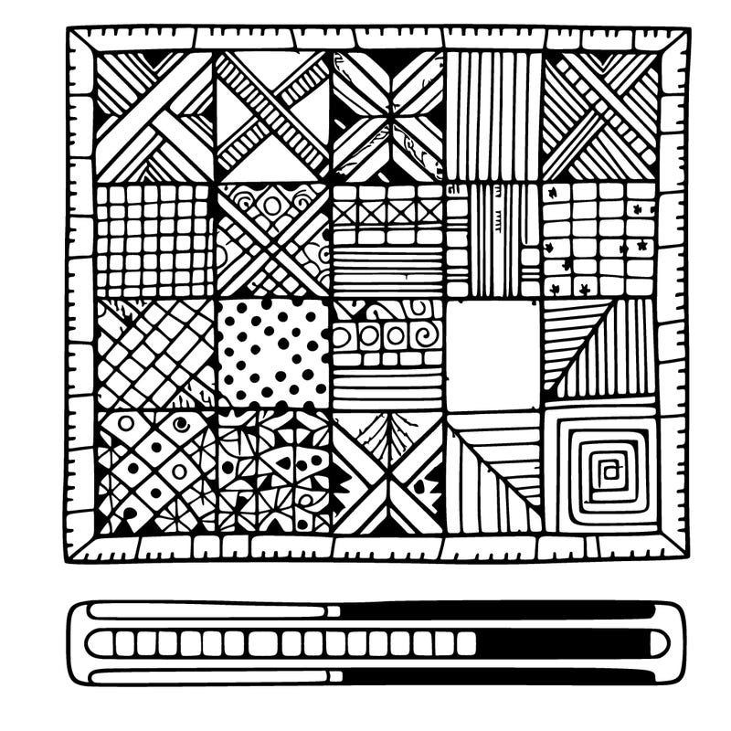 clean and bold: a simple patchwork quilt with various patterned squares.