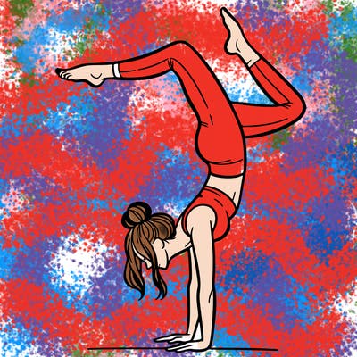 a woman doing a handstand