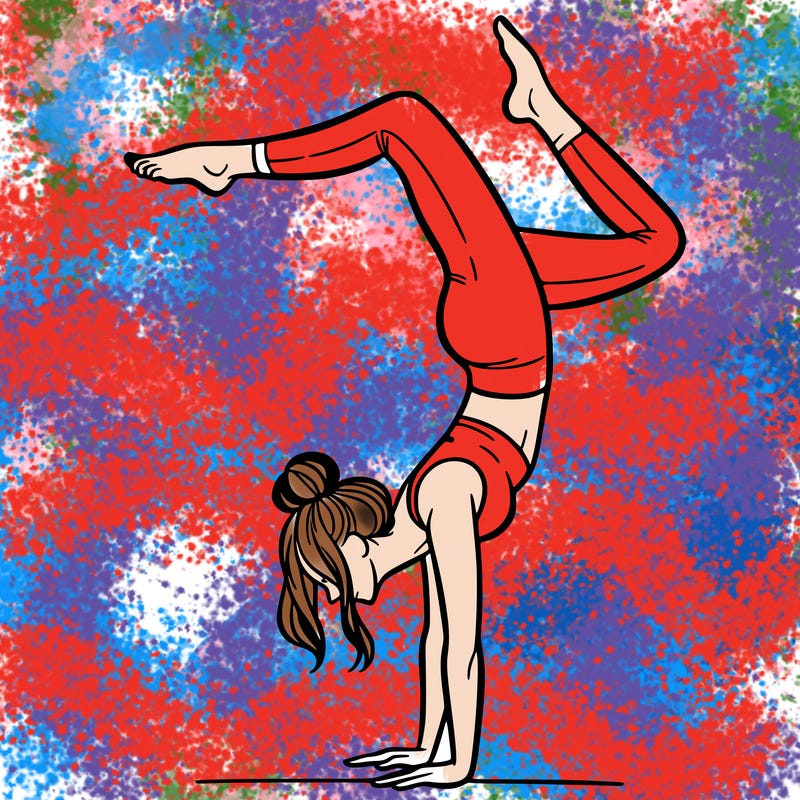 a woman doing a handstand