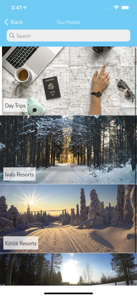 Pantalla de búsqueda de la aplicación TUI Santa Trips que muestra opciones de búsqueda para excursiones de un día y resorts de Laponia como Ivalo y Kittila.