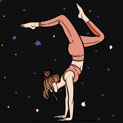 a woman doing a handstand