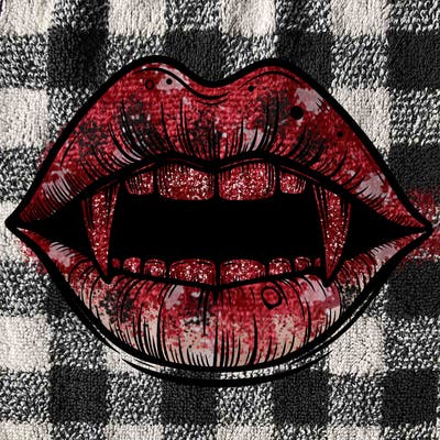 lips with vampire teeth