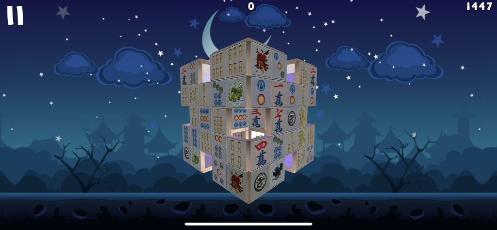 Mahjong Deluxe 3 Go - A 3D cube of Mahjong tiles set against a starry night background in Mahjong Deluxe 3 Go.