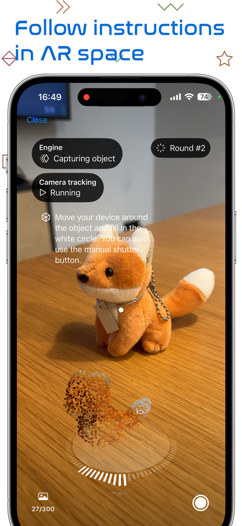 拡張現実を使用してキツネのぬいぐるみを3Dモデルにスキャンしているスマートフォンのインターフェース。