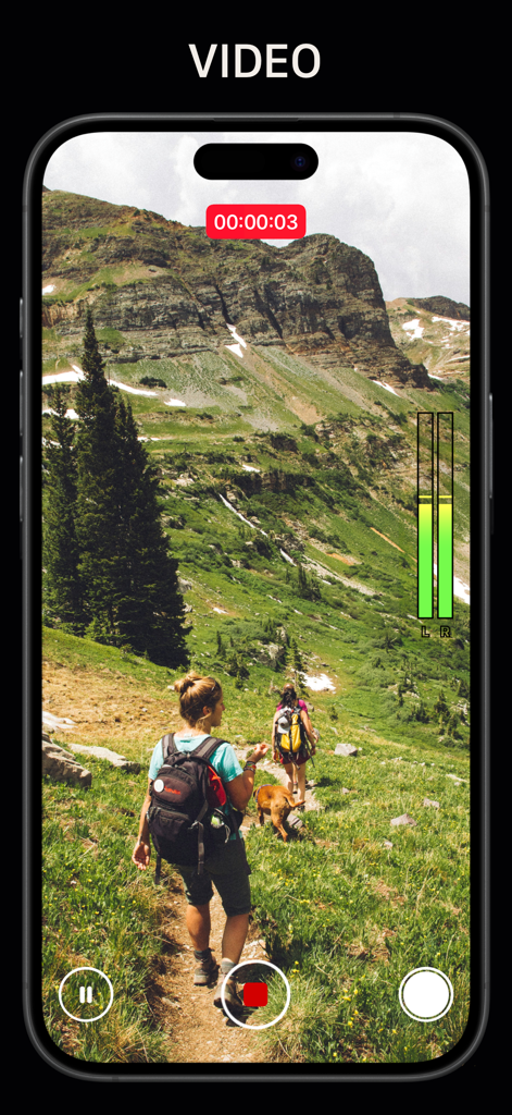 Smartphone screen showing the Pro Camera app interface recording video of hikers on a mountain trail with audio level meters and recording controls visible