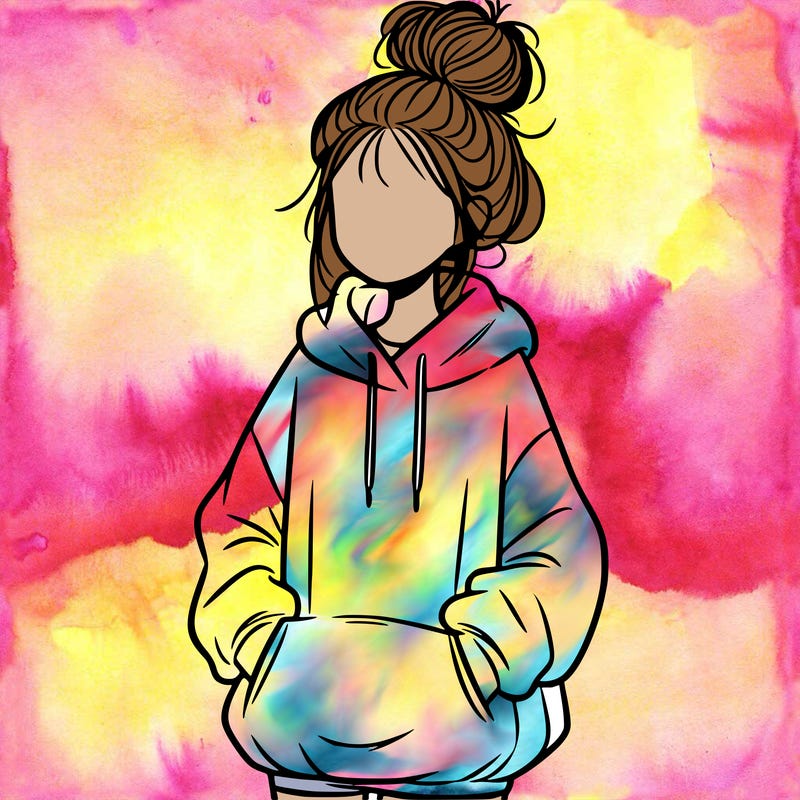 girl with baggy sweatshirt and messy bun