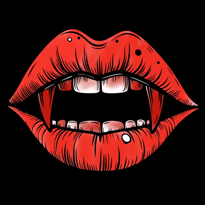 lips with vampire teeth