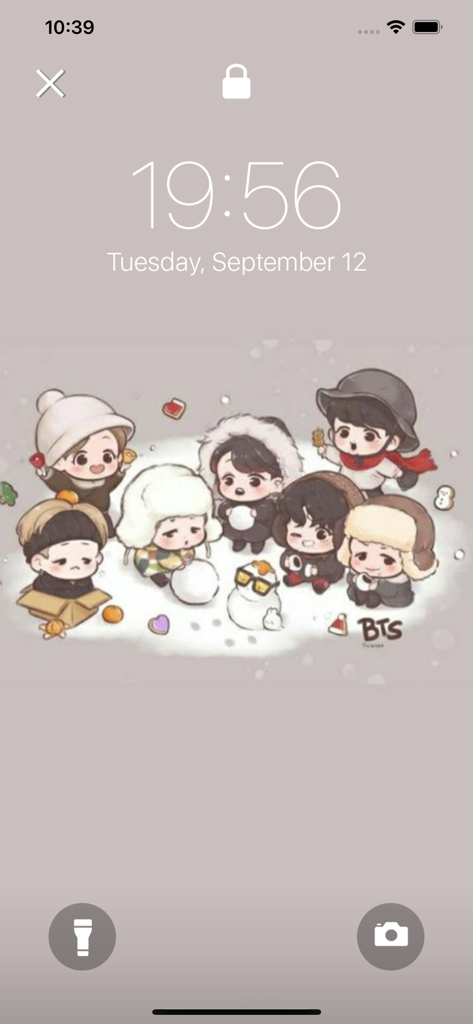 Cute BTS Live Wallpapers HD - Cartoon BTS members in winter clothes on an iPhone lock screen