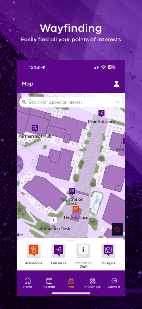 Una schermata di orientamento nell'app Misk Events con una vista a volo d'uccello della mappa di una sede dell'evento con etichette per ingressi e desk informativi