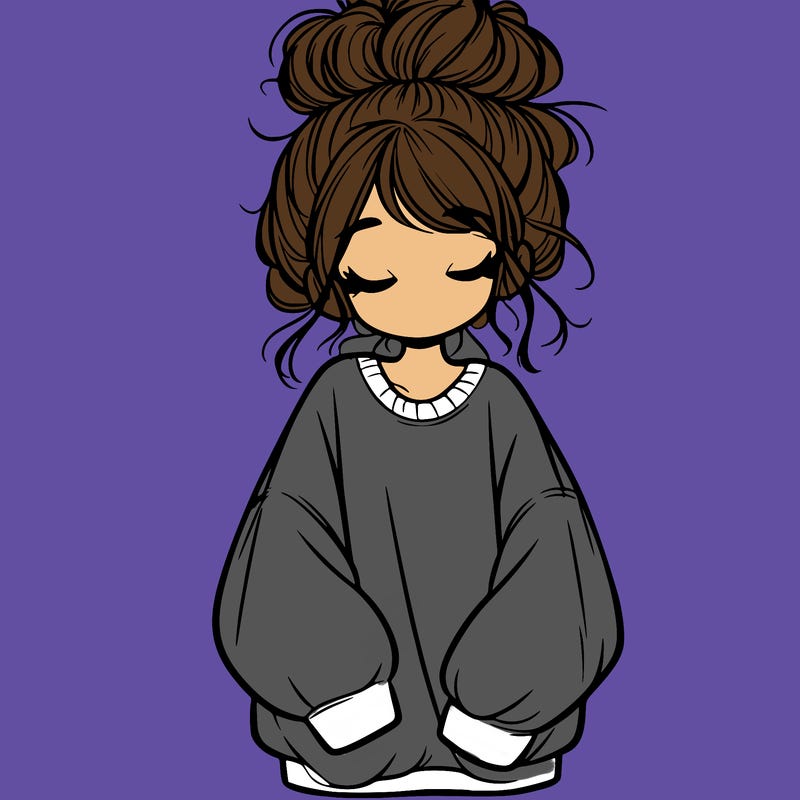 girl with baggy sweatshirt and messy bun