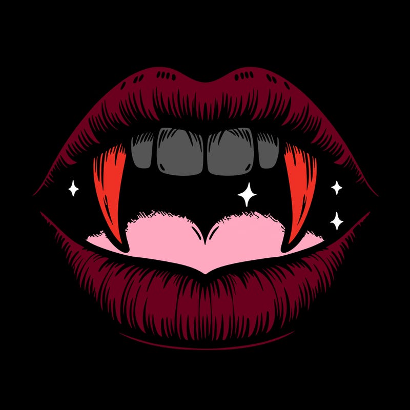 lips with vampire teeth