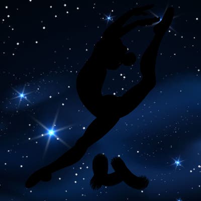 gymnast doing a leap in a leotard with a bent back leg