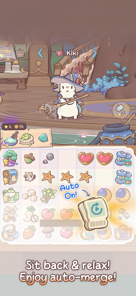 「Cats and Soup Magic Recipe」モバイルゲームで、魔法使いの猫キキがマージパズルボードの上に立っている。