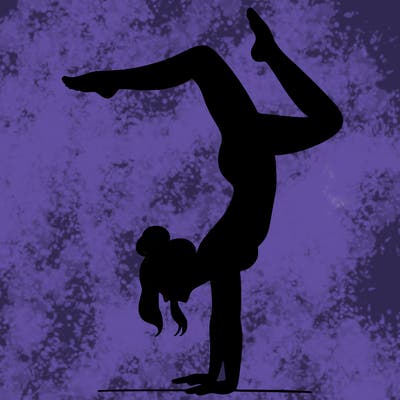 a woman doing a handstand