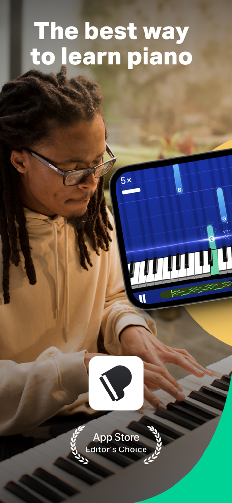 Piano by Yousician - A man with glasses playing piano using the Yousician app gamified learning interface on a smartphone