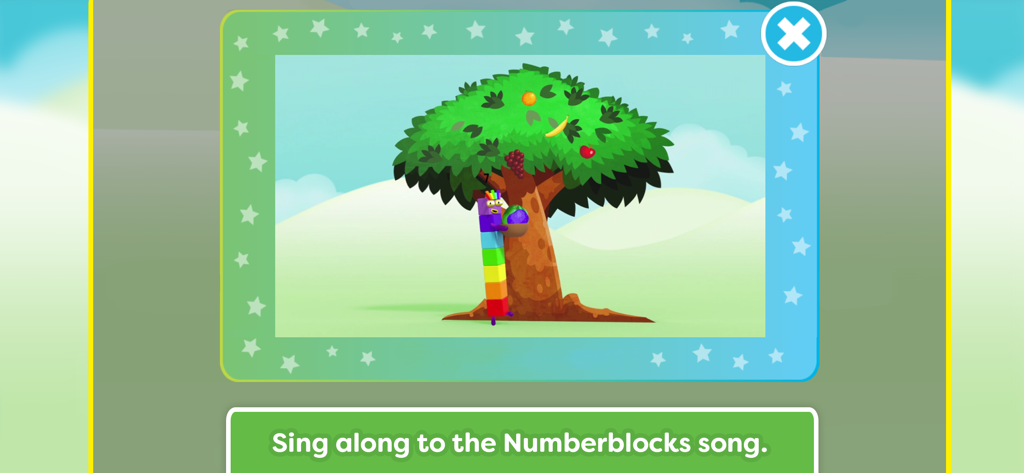 Meet the Numberblocks! - 果樹のそばにキャラクターが立っている、ナンバーブロックアプリの明るく教育的なシーンで、一緒に歌うプロンプトが表示されています