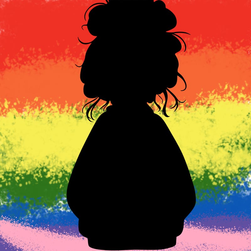 girl with baggy sweatshirt and messy bun