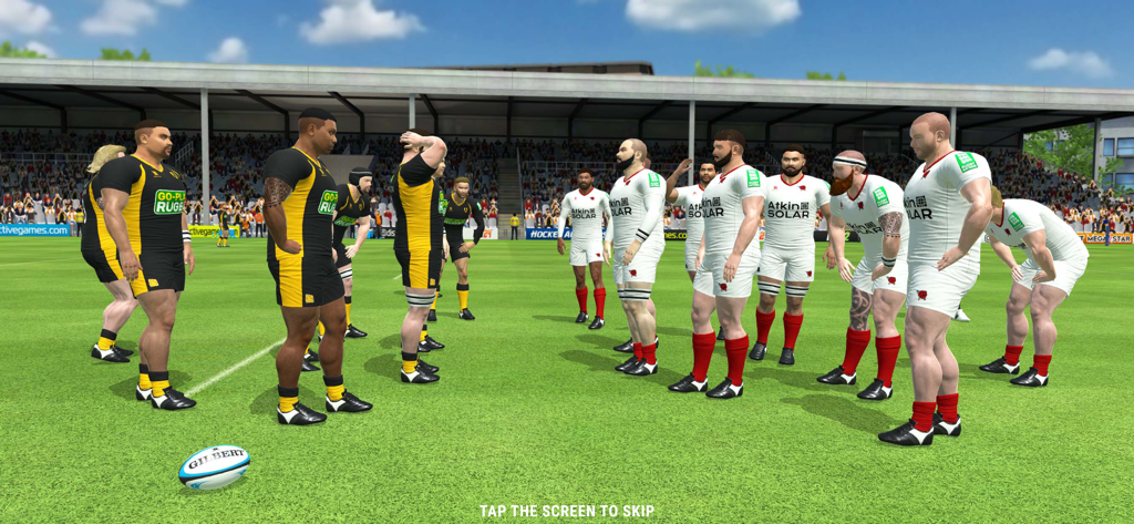 Deux équipes de rugby en uniformes noir et blanc se font face sur un terrain avant un match