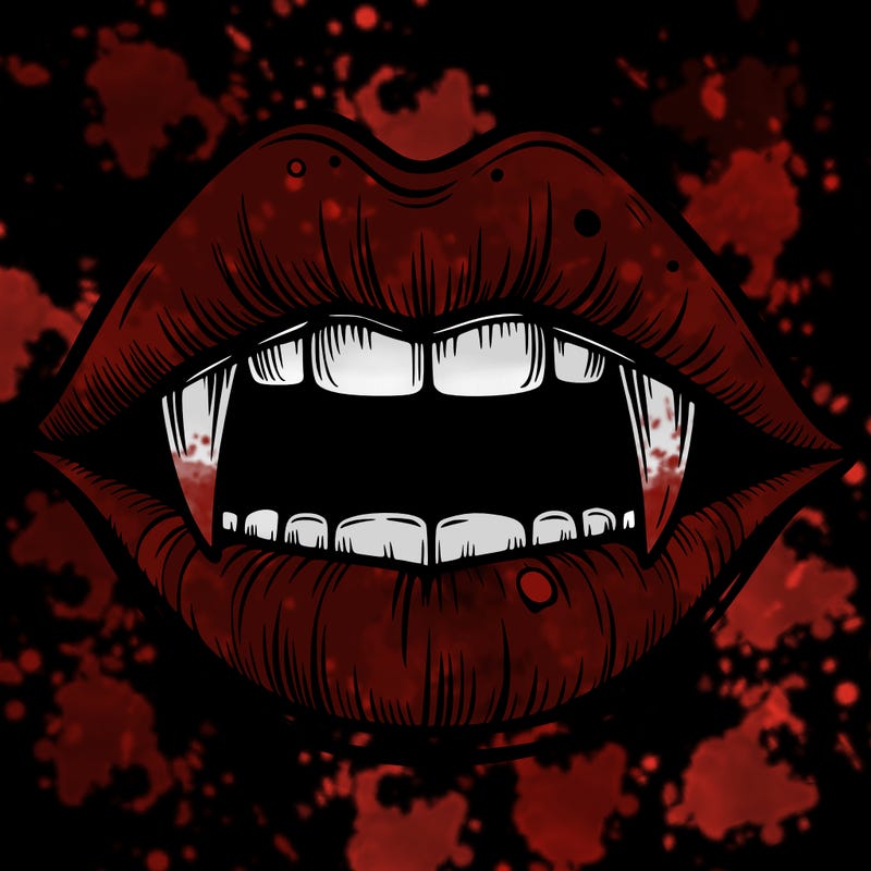 lips with vampire teeth