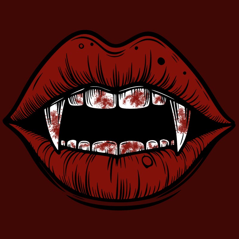 lips with vampire teeth