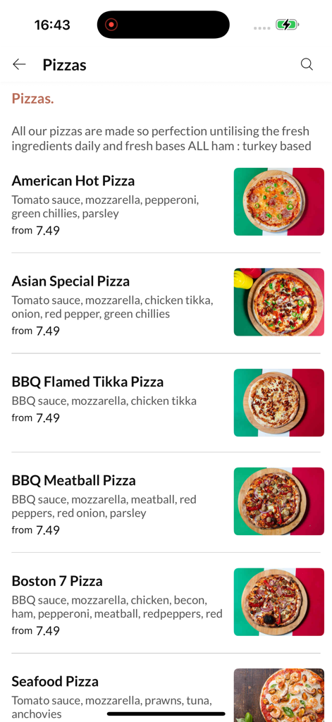 Menu screen of Village Pizzeria Accrington app showing a list of different pizza options with prices and descriptions