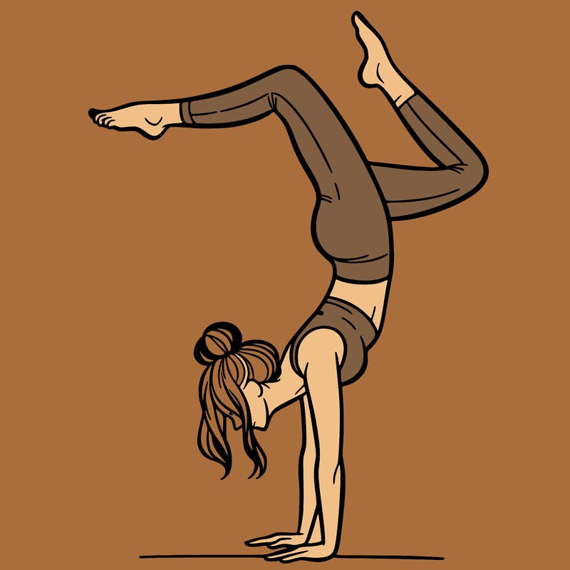 a woman doing a handstand