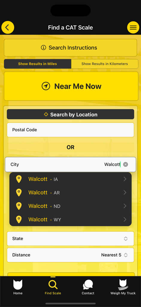 CAT Scale Locator - Interface do aplicativo CAT Scale Locator mostrando a tela de busca para encontrar uma balança com sugestões de cidades para Walcott