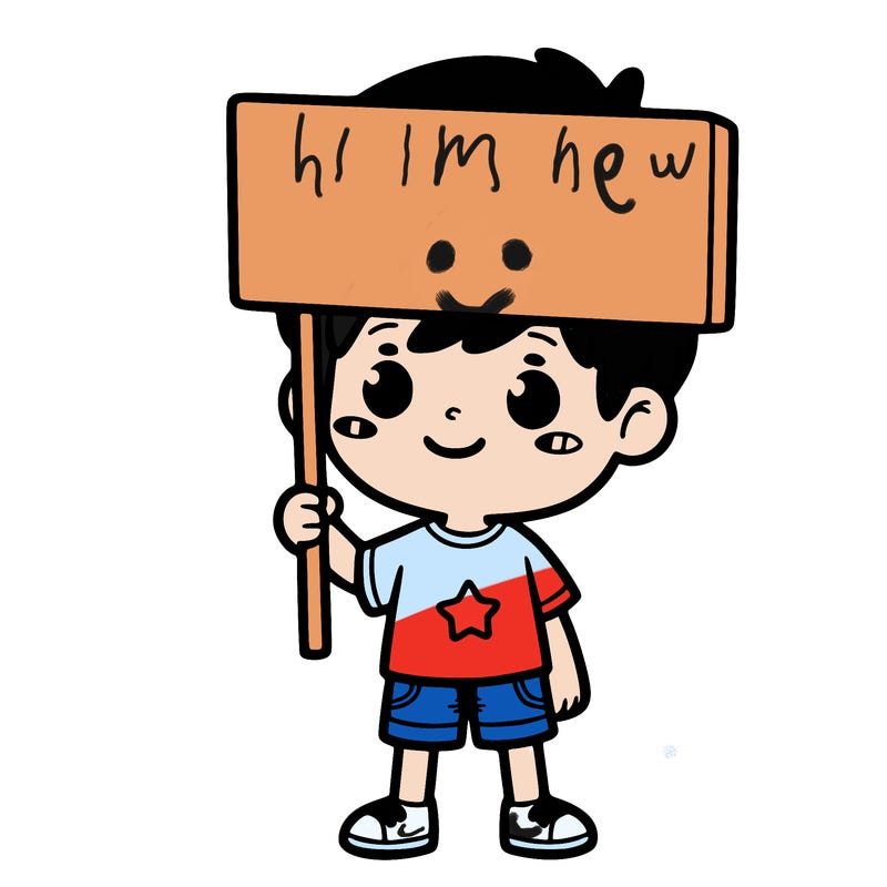 boy holding a sign