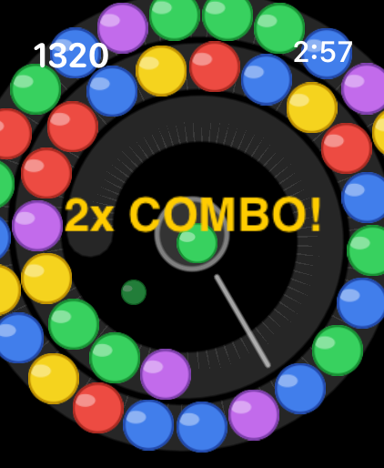 Crown Orbit - Jogabilidade do atirador de bolas Crown Orbit no Apple Watch mostrando um combo 2x e bolas coloridas