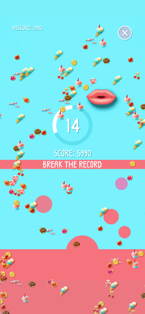 My  Lips - My Lips 앱의 미니 게임에서 떨어지는 사탕과 음식 아이템을 잡고 있는 한 쌍의 분홍색 입술