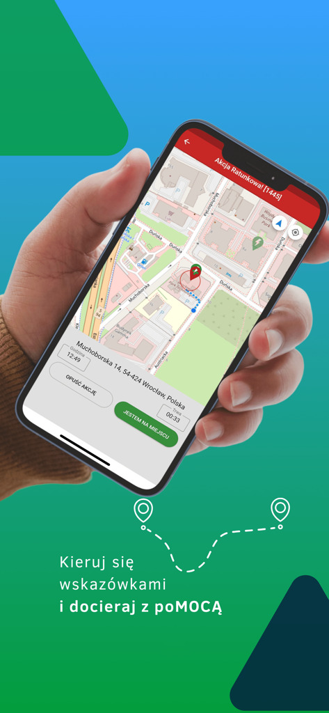 A hand holding a smartphone showing the Ratownik app navigation map with an emergency incident location and rescuer response buttons.