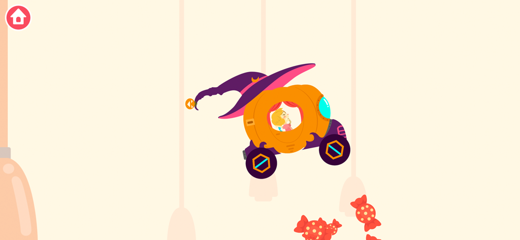 A child driving a pumpkin car with a purple witch hat in a candy themed game