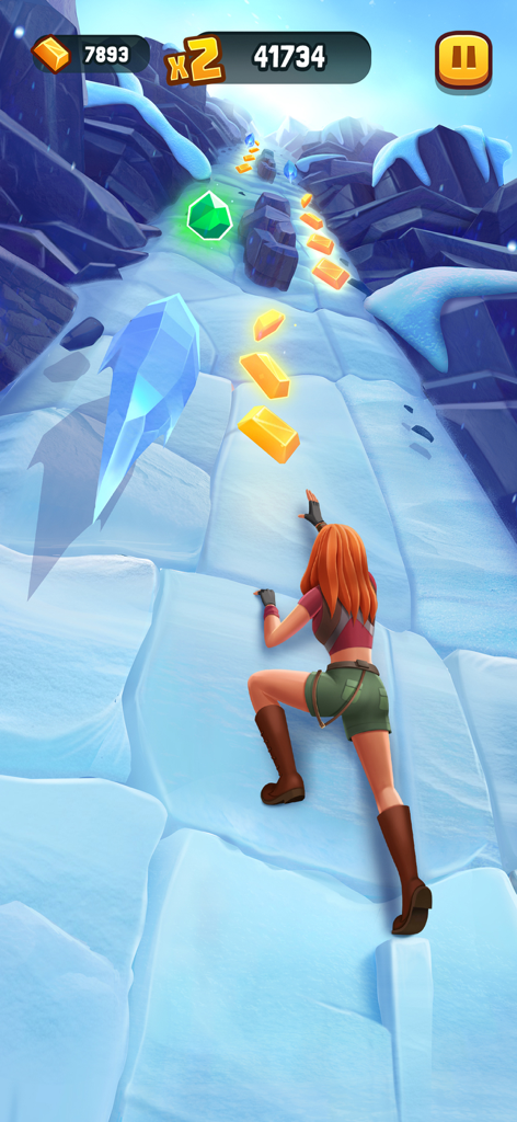 Personaje Ruby Roundhouse escalando un acantilado helado y nevado en el juego móvil Jumanji Epic Run.