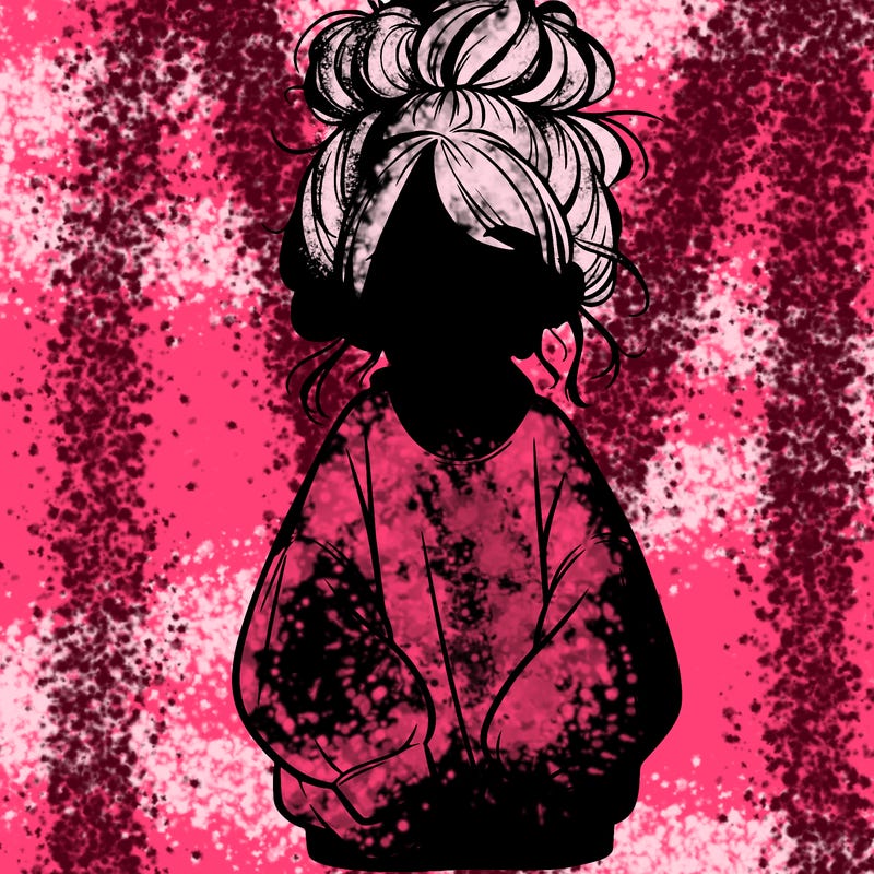 girl with baggy sweatshirt and messy bun