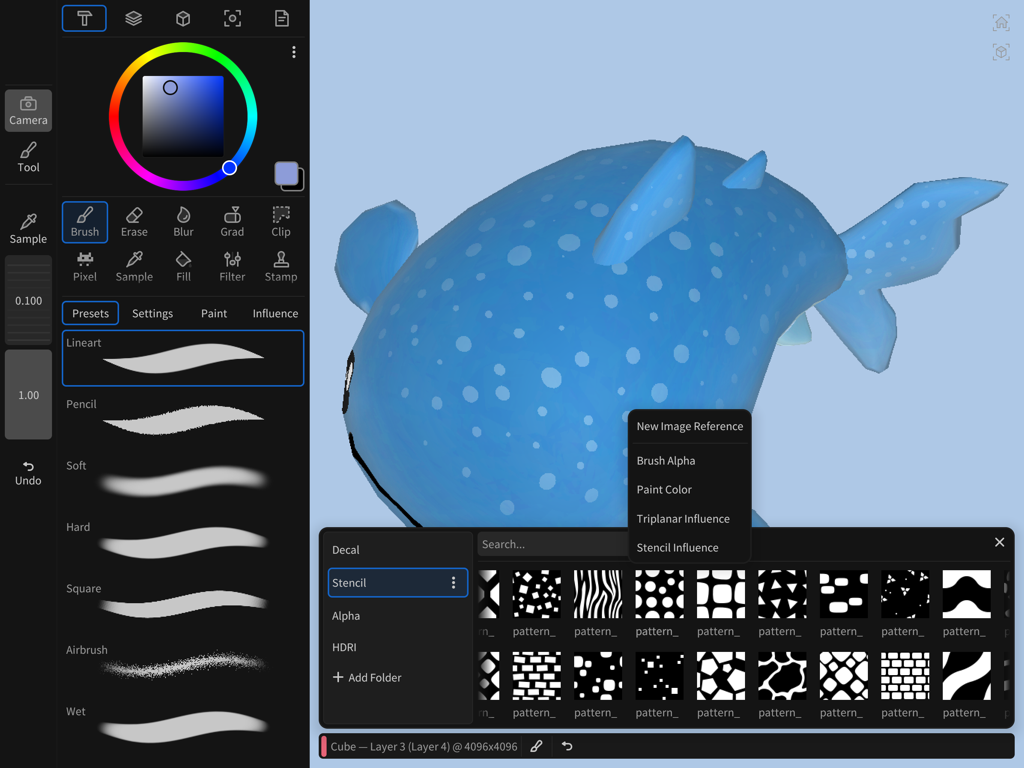 Wafer - 3D Texture Paint - Interfaz de Wafer 3D Texture Paint mostrando un modelo 3D de pez azul siendo texturizado con preajustes de pincel y plantillas.