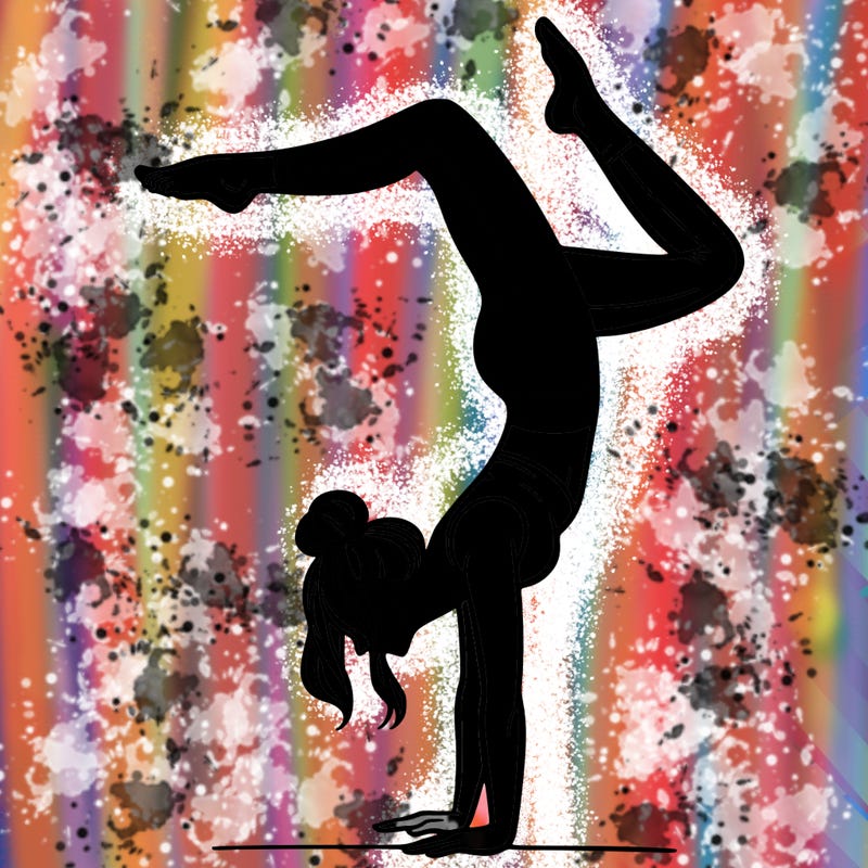 a woman doing a handstand