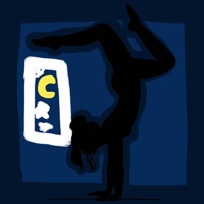 a woman doing a handstand