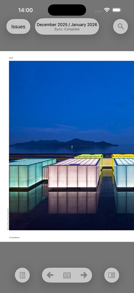 Aesthetica - The Aesthetica app interface displaying a high-resolution photograph of glowing architectural cubes at night.