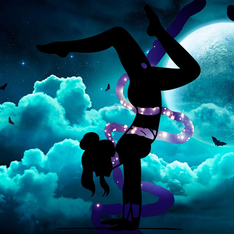 a woman doing a handstand