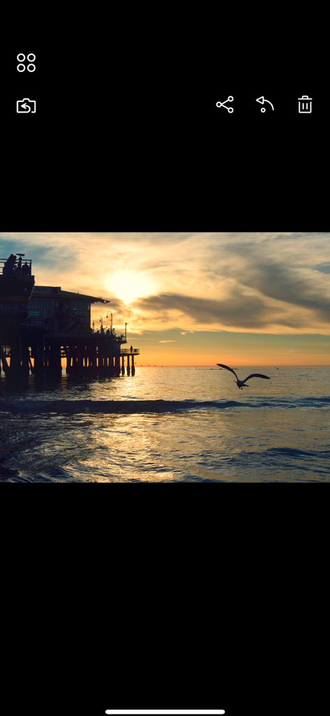 PIXPRO Remote Viewer - PIXPRO Remote Viewer app displaying a sunset photo over a coastal pier