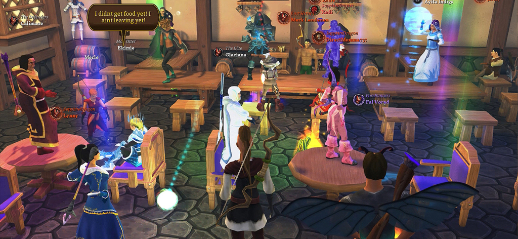 Villagers & Heroes - Un groupe de personnages joueurs socialisant et discutant à l'intérieur d'une taverne dans Villagers and Heroes