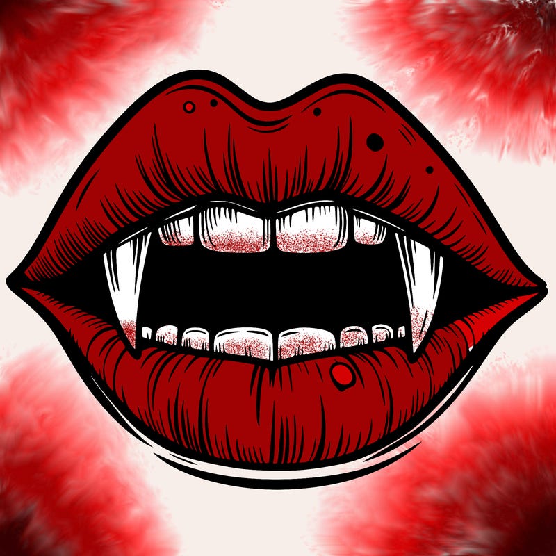 lips with vampire teeth